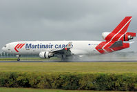 PH-MCW @ AMS - rain spotting at AMS - by Robbie0102