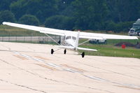 N77AF @ KDPA - American Flyers Cessna 172R, N77AF lifting off RWY 15 KDPA - by Mark Kalfas
