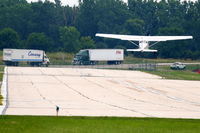 N77AF @ KDPA - American Flyers Cessna 172R, N77AF, lifting off RWY 15 KDPA - by Mark Kalfas
