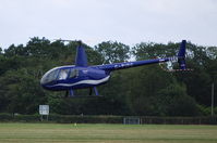 G-PIDG @ EGLD - Robinson R44 at Denham - by moxy