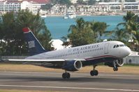 N705UW @ TNCM - taking off 27