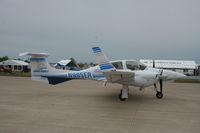 N905ER @ KOSH - DA 42 - by Mark Pasqualino