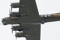 N93012 @ KDPA - Boeing B-17G, NL93012, a climbing left turn to 270' after departing RWY 20R KDPA... - by Mark Kalfas