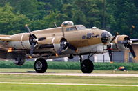 N93012 @ KDPA - Boeing B-17G, NL93012, landing RWY 20R KDPA, note the flame on number 4 - by Mark Kalfas