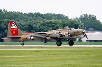 N93012 @ KDPA - Boeing B-17G, NL93012, landing RWY 20R KDPA, note the flame on number 4 - by Mark Kalfas