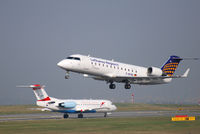 D-ACRL @ VIE - Canadair RJ200 with OE-LFJ in the background