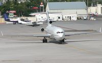 N199AJ @ TNCM - taxing to the runway - by daniel jef