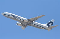 N319AS @ KLAX - Alaska Boeing 737-990, N319AS departing KLAX 25R for MMPR, Puerto Vallarta. - by Mark Kalfas