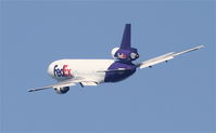 N318FE @ KLAX - FedEx  DC-10-10F, N318FE departing RWY 25L KLAX with a left turn at the coast. - by Mark Kalfas