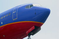 N239WN @ KLAX - Southwest Boeing 737-7H4, N239WN short final 24R KLAX. - by Mark Kalfas