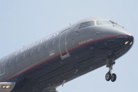 N919SW @ KLAX - Skywest Bombardier CL-600-2B19, N919SW short final RWY 24R KLAX. - by Mark Kalfas
