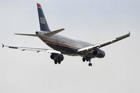 N667AW @ KLAX - US Airways Airbus A320-232, N667AW short final 24R KLAX. - by Mark Kalfas