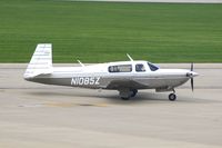 N1085Z @ CID - Taxiing past the tower to Landmark FBO. - by Glenn E. Chatfield
