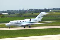 N750GM @ CID - Taxiing to Runway 27 for departure - by Glenn E. Chatfield