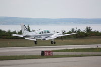 N705NC @ MGN - Landing RWY 28 - by Mel II