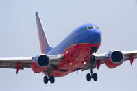 N239WN @ KLAX - Southwest Boeing 737-7H4, N239WN short final 24R KLAX. - by Mark Kalfas