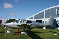 N617JJ @ KOSH - SR22 - by Mark Pasqualino