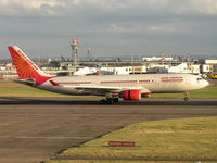 VT-IWB @ EGLL - Air India applying speed brakes