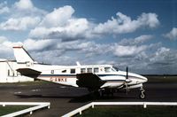G-AWKX @ CVT - Beech Queen Air seen at Coventry in the Spring of 1974. - by Peter Nicholson