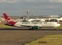 YL-LCZ @ EGLL - Virgin Nigeria rolling to stop