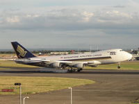 9V-SFD @ EGLL - WOW touching down
