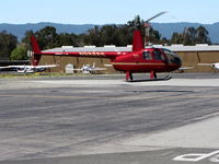 N9888S @ SQL - 2007 Robinson Helicopter Company R44 II lift off @ San Carlos Muni, CA - by Steve Nation