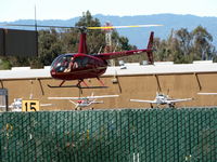 N9888S @ SQL - 2007 Robinson Helicopter Company R44 II left turn @ San Carlos Muni, CA - by Steve Nation