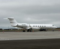 N144KK @ OAK - 1998 Gulfstream Aerospace G-V @ foggy Oakland Int'l (North Field), CA - by Steve Nation