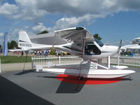 N103GX @ KOSH - Remos GX with floats - by Dennis Ahearn
