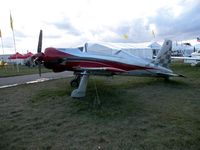 N360BR @ KOSH - At airventure 2009 - by Woody Harrington