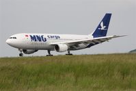 TC-MNC @ LFPG - on landing at CDG whis new paint - by juju777