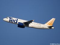 N154GJ @ IAD - Often spotted Ted bird, this time at Dulles - by Paul Perry