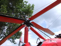 N1267B @ OSH - Rotor Head; Notice that the wings are supported by cables that keep them from drooping
