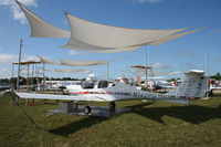 N142PU @ KOSH - DA 40