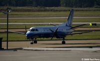 N309CE @ IAD - Colgan Saab 340 taxiing my way - by Paul Perry