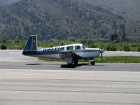 N9333M @ SZP - 1966 Mooney M20E SUPER 21, Lycoming O&VO-360 200 Hp, landing roll Rwy 22 - by Doug Robertson