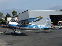 N7925V @ SZP - 1966 Cessna 180H, Continental O-470 230 Hp, long-range extra fuel-24 gallons in outer wing tips, highly mirror polished, refueling - by Doug Robertson