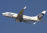 N622AS @ KLAX - Rising from rwy 25R. - by Philippe Bleus