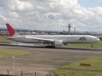 JA734J @ EGLL - JAL touching down