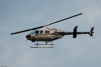 N153P - State Police Helicopter in Flight