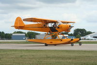N4128G @ KOSH - Ttee 18 - by Mark Pasqualino