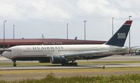 N249AU @ TIST - Us air heavy landing at tist - by daniel jef
