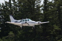 N413D @ MGN - Landing RWY 28 - by Mel II