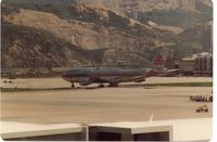 LX-DCV - Arrival at HKG Kai Tak,1980 - by metricbolt