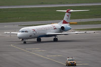 OE-LVJ @ VIE - Fokker 100 with special sticker Kronen Zeitung (austrian newspaper) - by Juergen Postl