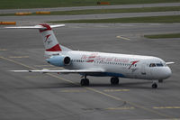 OE-LVJ @ VIE - Fokker 100 with special sticker Kronen Zeitung (austrian newspaper) - by Juergen Postl