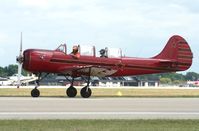 N52BN @ KOSH - YAK 52