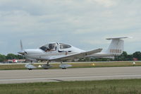N810DS @ KOSH - DA 40 - by Mark Pasqualino