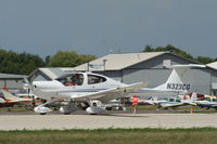 N323CG @ KOSH - DA 40 - by Mark Pasqualino