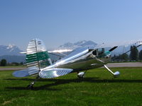 CF-EKU @ CYCW - Polished Aluminum Metallic Green 2 seat 85 HP Continental - by Dave Zoppa